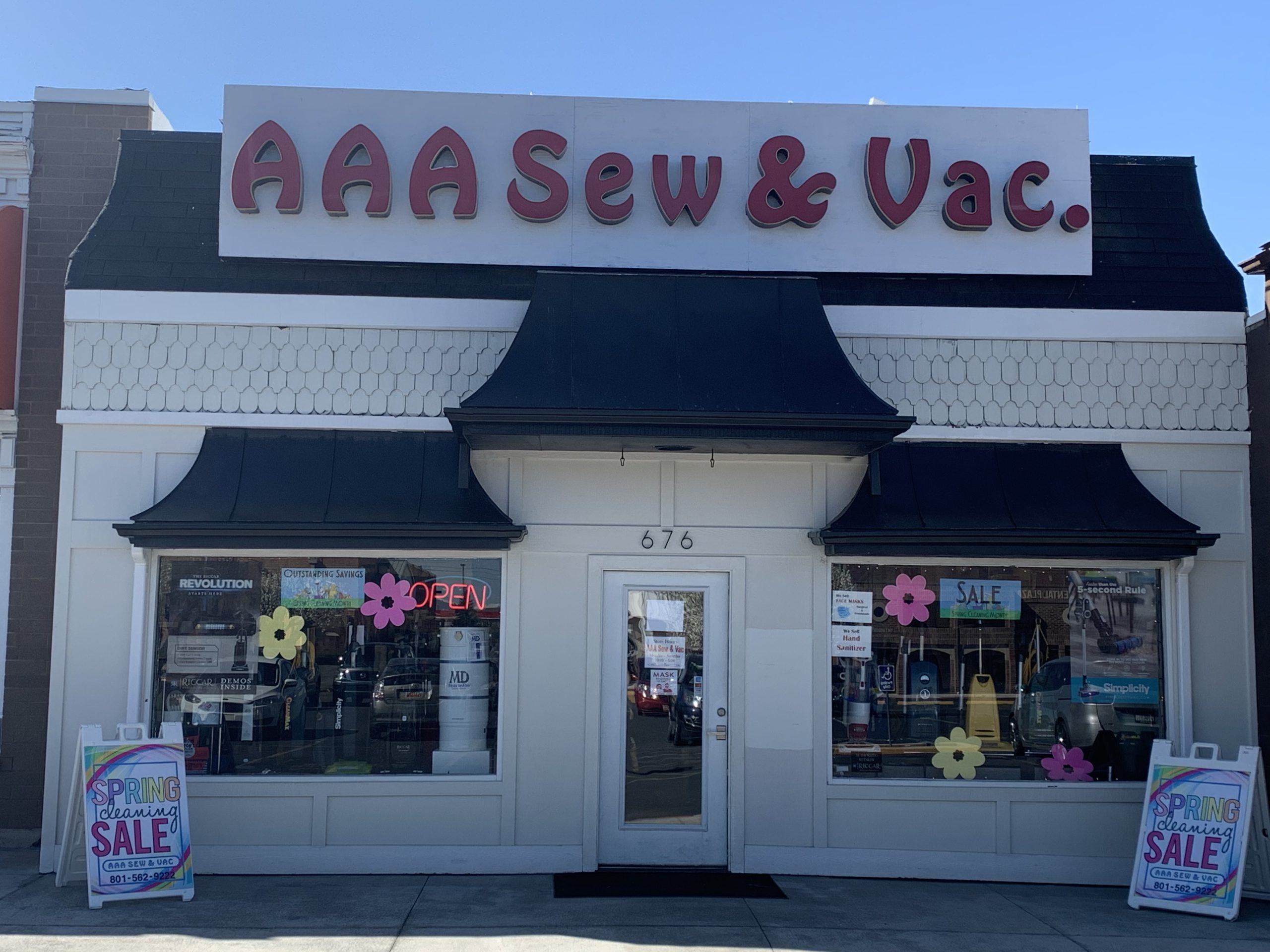 Front of Store AAA Sew and Vac at night